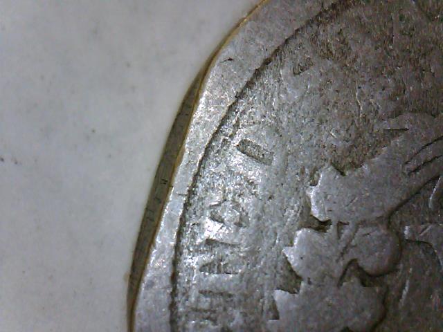 1910 Liberty Nickel clipped planchet error showing curved bite missing from coin edge
